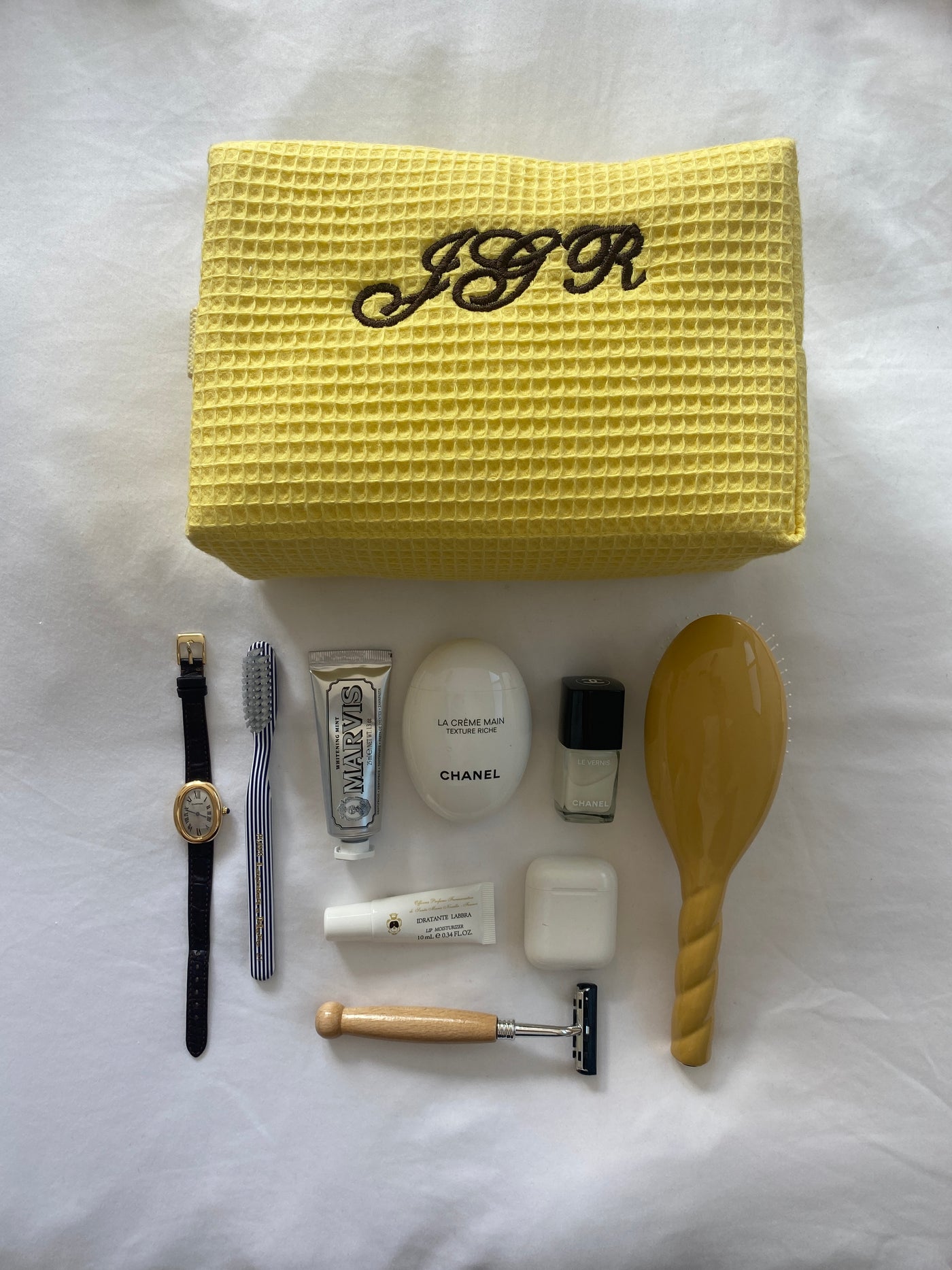 Large yellow monogrammed makeup bag